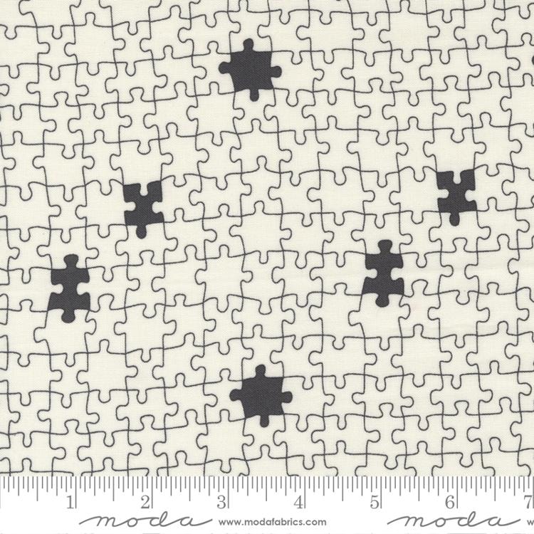 Puzzled - Cream Black